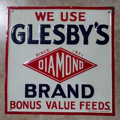 SOLD vintage metal feed sign