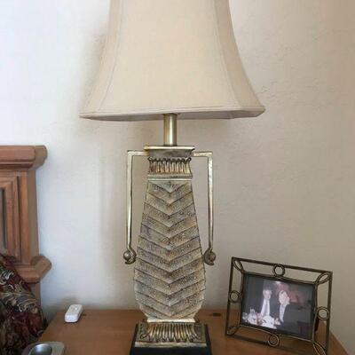 Lovely pair of bedside or end table lamps with shades. 37” tall.