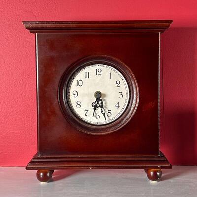 MANTEL CLOCK | Having a round face with Arabic numerals, battery operated and runs great; 9 x 8 in.