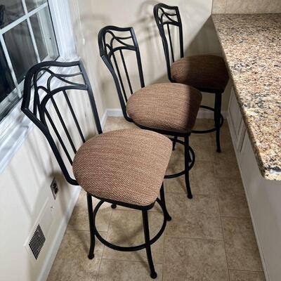 (3pc) BAR STOOLS | A set of 3 barstools with openwork iron seatbacks and like new fabric seat cushions over four legs; h. 40 x 18 x 21 in.