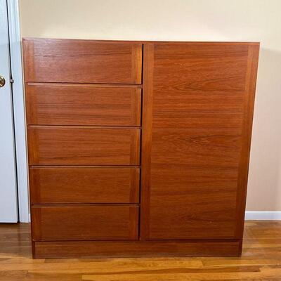 DANISH DRESSER CABINET | Danish modern wood cabinet having a wardrobe door with shelves on the right, and five drawers on the left; h....