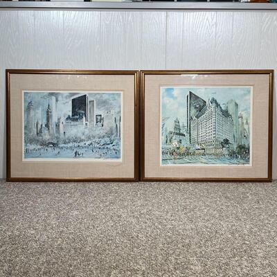 PAIR NYC SCENES | A pair of framed prints of paintings of New York City, each pencil signed lower right, from an edition of 300 and 325;...