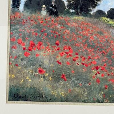 AFTER CLAUDE MONET | Reproduction print of an impressionist landscape with figures, in a gold frame; overall 27 x 32 in.