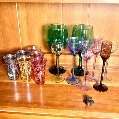 (14pc) COLORFUL SMALL GLASSWARE | Six multi-colored shot glasses with etched scrollwork motif (h. 3-1/2 in.); six multi-colored long stem...