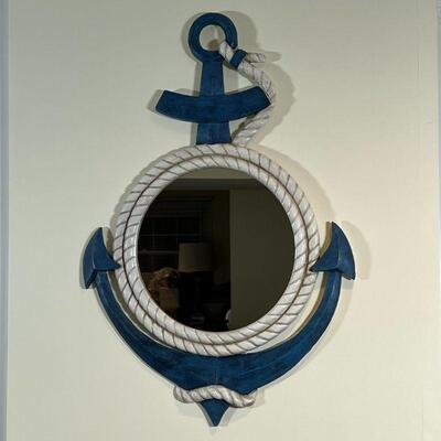 NAUTICAL WALL MIRROR | Round mirror in an anchor and rope painted frame; 28 x 18-3/4 in.