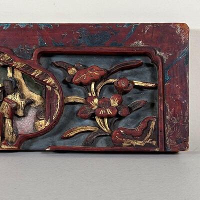 CHINESE CARVED PANEL | Carved in high relief showing figure in a court-yard scene; h. 5 x 17 in.