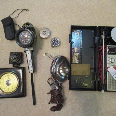 GENERAL ELECTRIC EMERGENCY 2WAY RADIO IN CASE, SPOTLIGHT, WINDAIL WIND SPEED INDICATOR, HYGROMETER, MONOCULAR AND 2 COMPASSES