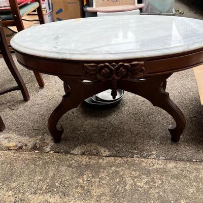 Antique Eastlake coffee table with marble top