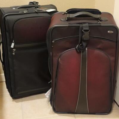 (2) Tumi Suitcases with Manufacturer Tags Attached
