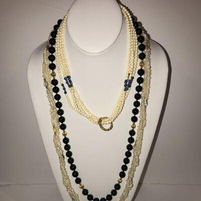 Pearl, bone , lapis onyx & gold 