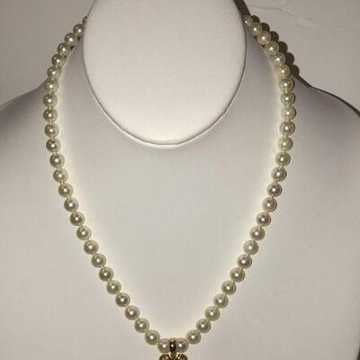 Good pearls and 14K  gold pendant & clasp 
