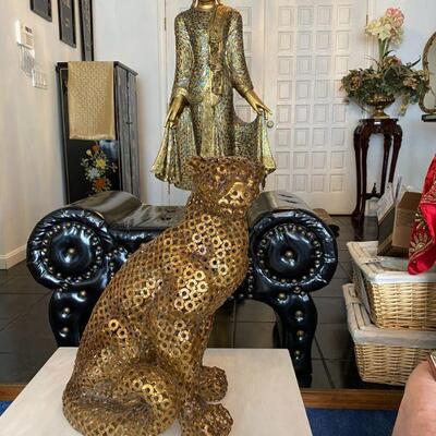 Studded vanity chair , Pierced Metal Leopard and Mosaic Standing Buddha 