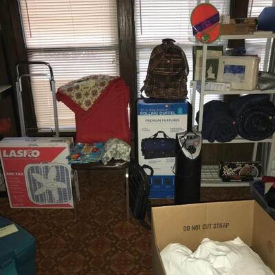 Fan, heater, Rolling duffel bag (NIB); sleeping bags, Swivel Sweeper (NIB); Homedics Back Rejuvenator 