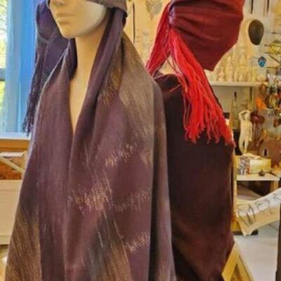 By Gayle White. Three foam mannequins draped in hand woven, hand dyed shawls