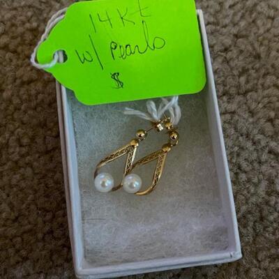 14kt gold earrings w/pearls  not left overnight on property 