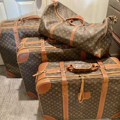 Faux Vuitton luggage