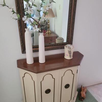 small cabinet and mirror