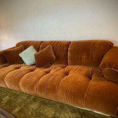 Vintage Italian velvet “marshmallow” sofa from late 1970s. Excellent condition. 8’ long. Brass base. 