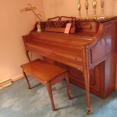 Quality piano...with bench..
