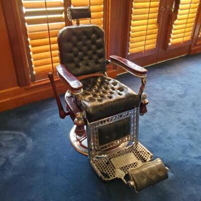 #150 â€¢ Theo A Kochs Barber Chair Measures Approx 27"x44"x45"