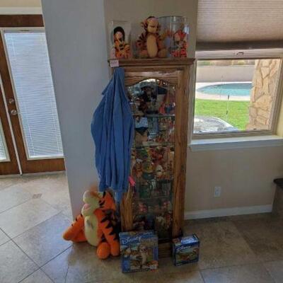 #3152 • Tiger Figurines, Puzzles, And More : Tigger Figurines, Puzzles, And More. Cabinet Not Included 