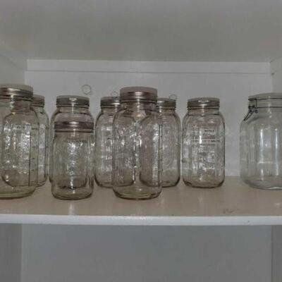 #2474 â€¢ 9 Glass Jars Includes Fido, Kerr, and Ball