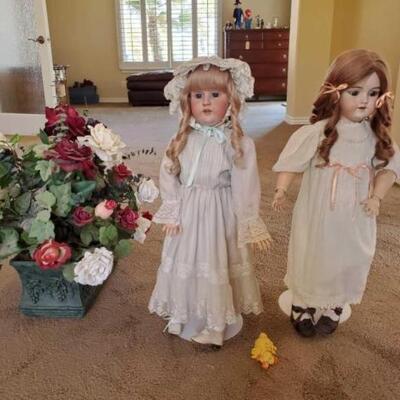 1220 â€¢ Antique Dolls, Fake Flower Arrangement, and Duck Decor