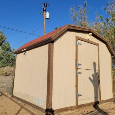 22:? Wooden Shed Approx 10'x8'x8.5'. Interior Contents Not Included
