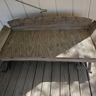 #1014 â€¢ Antique Wagon Seat  Measures Approx: 44"Ã—25"Ã—14" Surrounding Contents NOT Included