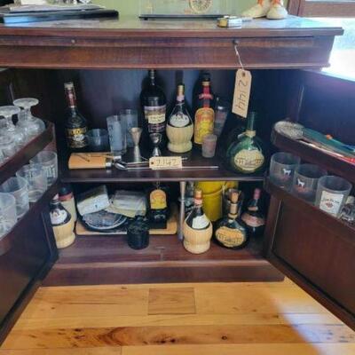 2142	

Bottle Collection, Glasses, And More
Does Not Include Cabinet