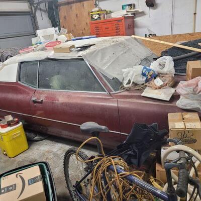 1970 Cadillac, has been sitting in the garage for at least 20 years, needs at least one tire to get it out of the garage, interior is in...
