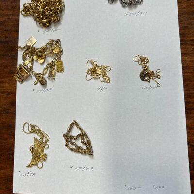 Assorted gold necklaces and chains