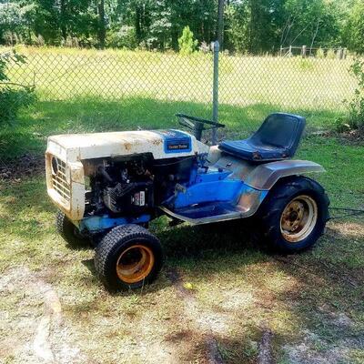 Vintage Montgomery Ward Lawn tractor. Runs great. New battery. Has multiple attachments.