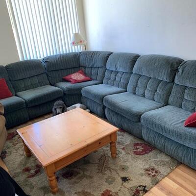 Sectional sofa in excellent condition. Hide-a-bed and reclining sections