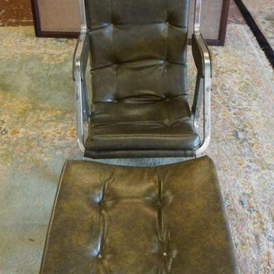 1338	UNUSUAL MODERN RECLINING VINYL CHAIR & OTTOMAN, MISSING SOME BUTTONS
