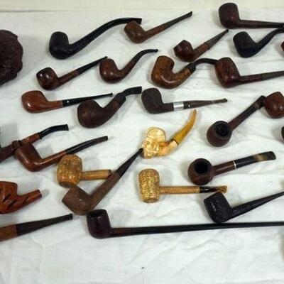 1083	GROUPING OF VINTAGE PIPES
