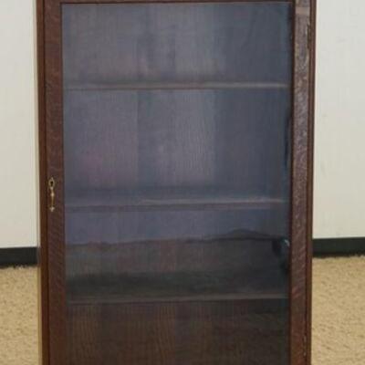 1335	OAK GLASS DOOR BOOKCASE, TOP SECTION HAS CARVED DECORATION & 2 COMPARTMENTS W/GLASS DOORS & BEVELED MIRROR, 29 IN WIDE X 66 1/4 IN...