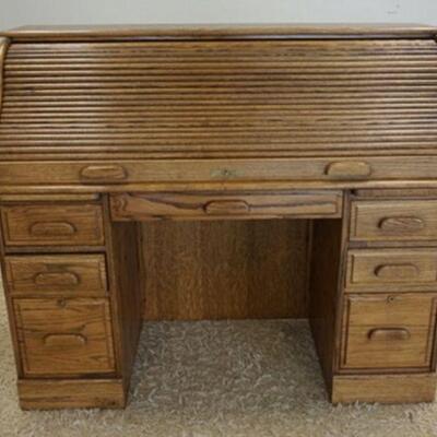 1168	ANTIQUE SOLID OAK SLANT FRONT LADY'S WRITING DESK, ONE DRAWER, APPROXIMATELY 30 IN X 16 IN X 48 IN HIGH
