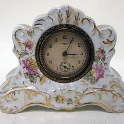 1140	MINIATURE NEW HAVEN CHINA CLOCK, APPROXIMATELY 6 IN X 2 IN X 5 IN
