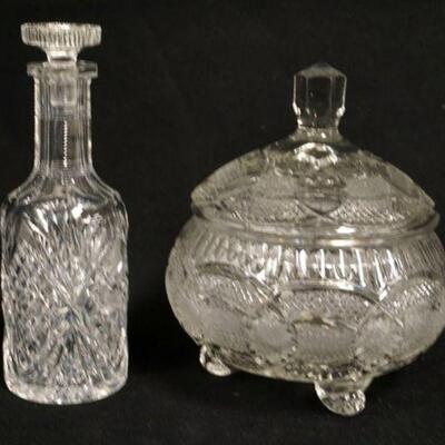 1257	CUT GLASS BOTTLE & COVERED JAR, BOTTLE STOPPER HAS AN EDGE CHIP, 7 1/4 IN HIGH
