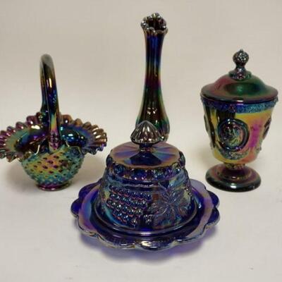 1225	4 PIECE CONTEMPORARY CARNIVAL GLASS, BASKET & COVERED JAR ARE SIGNED FENTON, VASE IS 10 IN
