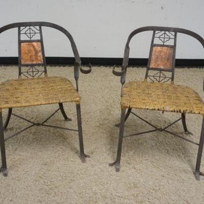 1189	PAIR OF METAL ARTS & CRAFTS STYLE CHAIRS, CONTINOUS ARM W/COPPER PANEL ON BACK & WOVEN SEATS, SEATS WORN
