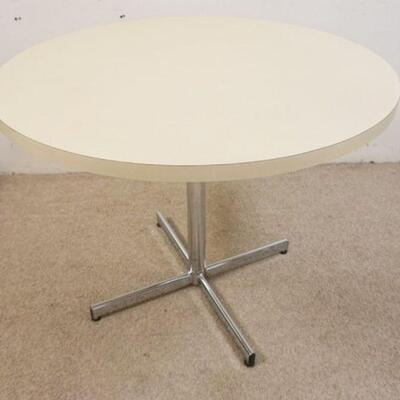 1060	MODERN STYLE ROUND FORMICA TABLE ON CHROME BASE, APPROXIMATELY 39 IN X 29 IN HIGH
