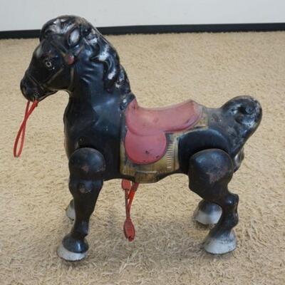 1175	METAL MOBO CHILDS RIDING HORSE, APPROXIMATELY 27 IN X 30 IN HIGH
