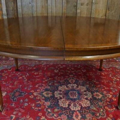 1181	JOHN STUART WALNUT BANDED OVAL DINING TABLE W/3 LEAVES, APPROXIMATELY 45 IN X 71 IN X 30 IN HIGH, EACH LEAVE 18 IN WIDE
