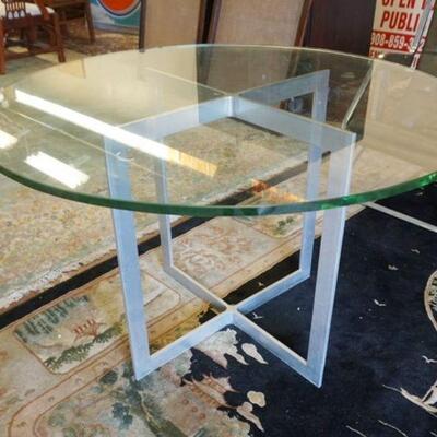 1337	MODERN ALUMINUM ROUND GLASS TOP TABLE, APPROXIMATELY 46 IN ROUND X 26 IN HIGH
