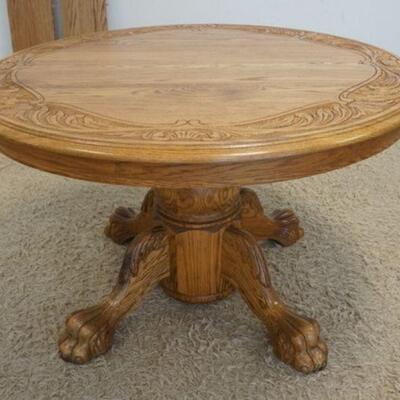 1161	CONTEMPORARY SOLID OAK CLAW FOOT TABLE W/CARVING & 2 LEAVES, 48 IN ROUND X 30 IN, LEAVES 11 1/2 IN EACH
