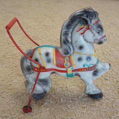 1173	METAL MOBO CHILDS VINTAGE PUSH TOY HORSE, APPROXIMATELY 20 IN X 21 IN HIGH
