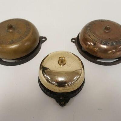 1011	LOT OF 3 ANTIQUE CAST IRON & BRASS DOOR BELLS, MECHANICAL, EARLIEST PATENT DATE 1860, LARGEST APPROXIMATETLY 6 IN X 2 1/4 IN HIGH
