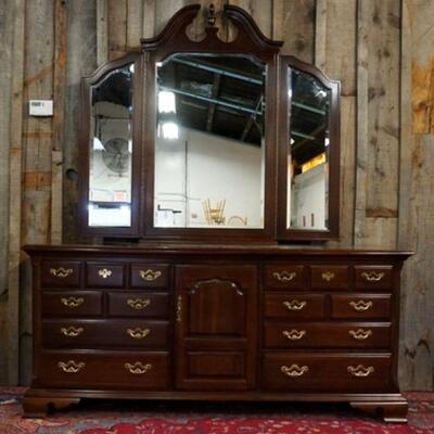 1185	THOMASVILLE CHERRY TRIPLE DRESSER W/TRIFOLD BEVEL EDGE MIRROR, APPROXIMATELY 72 IN X 20 IN X 33 IN HIGH
